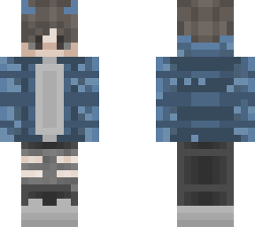 really cute boy with blue hoodie and ripped black pants and grey shoes and horns