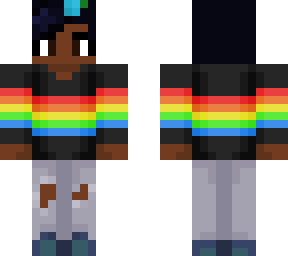 person in rainbow shirt with trans themed flowers