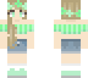 blonde wearing green crop top with a jean skirt and sneakers with white socks