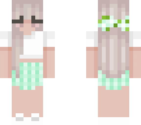 green skirt with white t-shirt and blond hair