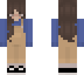 beige overalls and a blue sweater