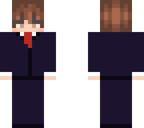 boy in dark blue suit and tie