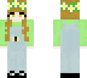 girl wearing overalls with a bee