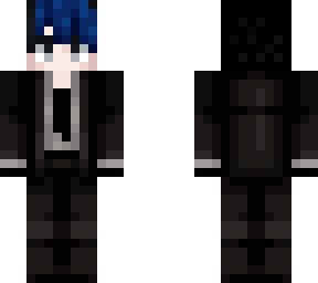 male with black and blue hair in tuxedo