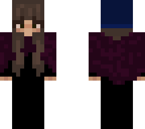 a girl in a poncho and beanie-lol