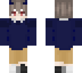 albino boy with blue sweater and a light shade of brown pants