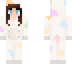 brunette girl in pastel rainbow cow onesie