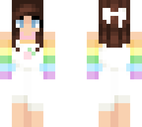 brunette girl in rainbow shirt and white overalls