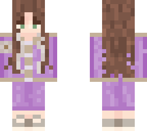 girl wearing purple suit and flower