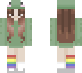 brown haired girl wearing frog hoodie and pride socks