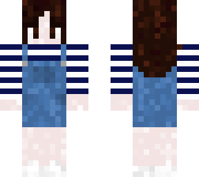 girl with denim overalls and striped blue and white shirt