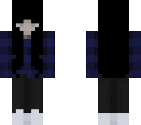 muted tones (blue sweater, dark denim)