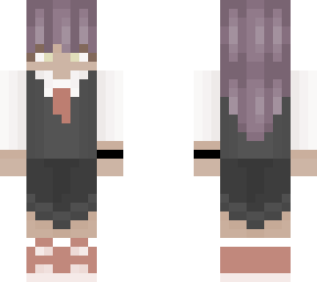 woman in a suit and a skirt