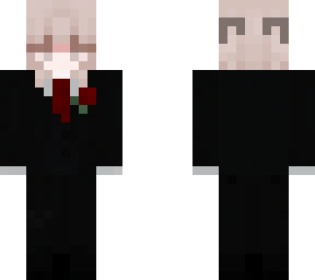 traje b)