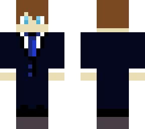 boy in a dark blue suit with a casual skin underneath