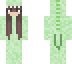 brown haired girl in green dino onesie
