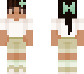 dark brown haired girl in green aesthetic clothes