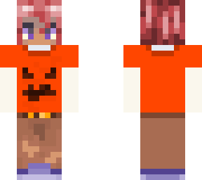 non binary person w/ pumpkin shirt
