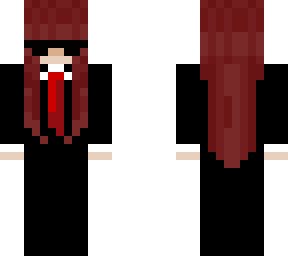 swagged out girl with red hair in suit