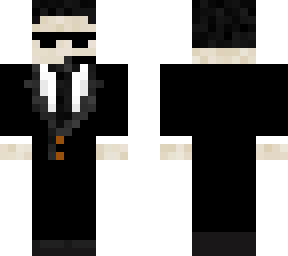 man in black suit with microphone
