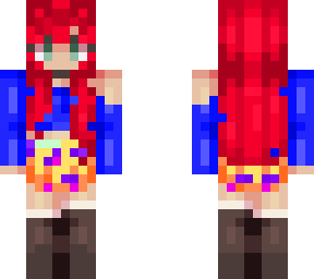 red head with a blue shirt and rainbow mess skirt