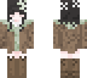 girl in green dressed in brown coat