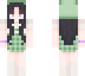 girl in green overalls w hat