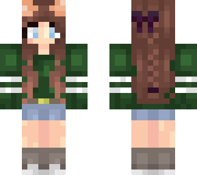 brown haired girl with green sweater