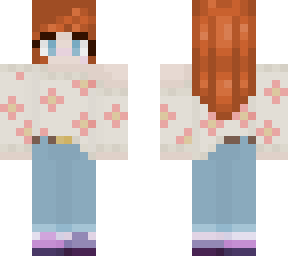 red haired person with flower sweater