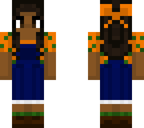 orange and green blouse with blue overalls and boots
