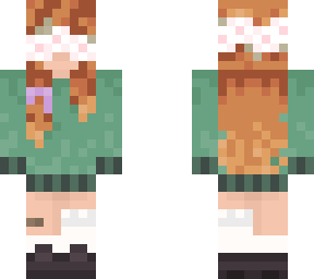 strawberry blonde in green sweater