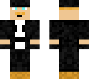 the black suit with brown boots
