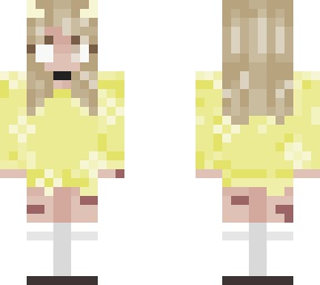 a beautiful woman in a yellow dress with flower