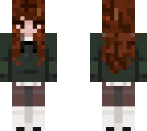 brown hair girl with green sweater