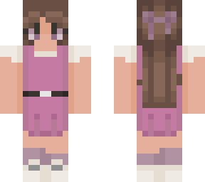 a girl in a pink dress
