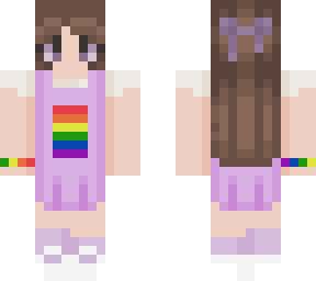 a girl in a purple dress with rainbow details