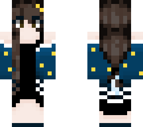 girl in blue and black w/ brown eyes, brown hair