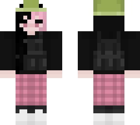 girl with black and pink hair, and a frog hat.
