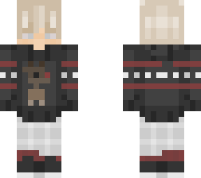 blonde boy in a gray christmas sweater