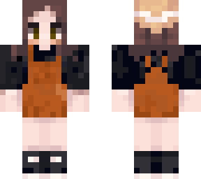 girl in orange brown overalls skirt