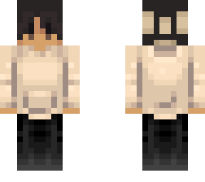 boy with beige pullover and black pants