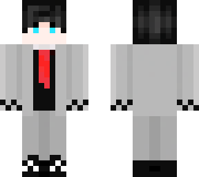 chico con traje gris.