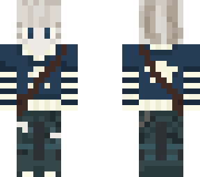 blond haired boy, with a blue star sweater with green cargo pants